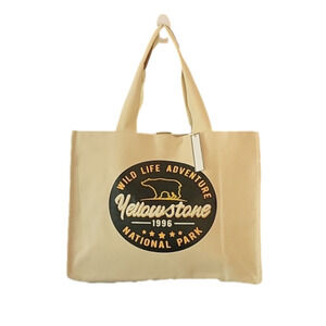 Yellowstone tan, thick, tote with inner liner. NWT